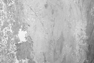 Old concrete wall with scuffs of gray color, texture background