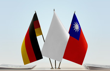 Flags of Germany and Taiwan with a white flag in the middle