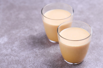 Indian turmeric milk with saffron, cardamom and turmeric. Copyspace