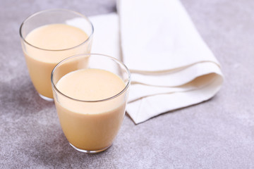 Indian turmeric milk with saffron, cardamom and turmeric. Copyspace