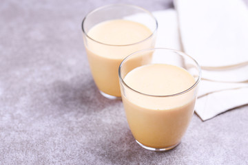 Indian turmeric milk with saffron, cardamom and turmeric. Copyspace
