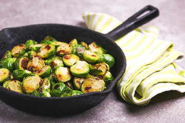 Vegetarian cuisine. Brussels Sprouts roasted with olive oil. Copyspace