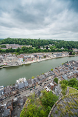 Fototapeta premium Meuse River passing through Dinant, Belgium.