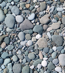 Fototapeta na wymiar pebble stones at the beach
