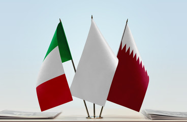 Flags of Italy and Qatar with a white flag in the middle