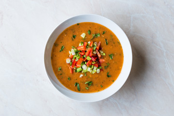 Traditional Konya Bulgur Soup Batirik with Sliced Cucumber, Tomatoes, Onion and Parsley