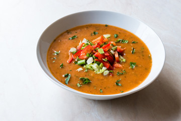 Traditional Konya Bulgur Soup Batirik with Sliced Cucumber, Tomatoes, Onion and Parsley
