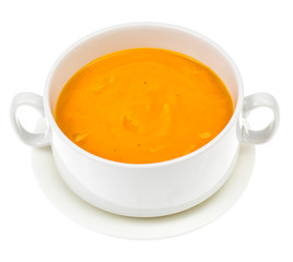 Cream soup of carrots, pumpkins, vegetables in white soup