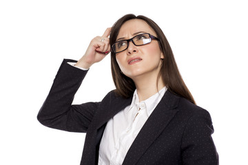 Confused businesswoman with questioning gesture posing on white background - obrazy, fototapety, plakaty