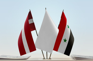 Flags of Latvia and Syria with a white flag in the middle