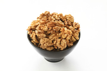 Walnuts pile isolated on white background. 