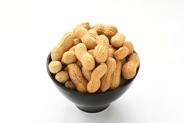 Peanuts pile isolated on white background. 