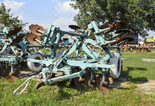 Plow on trailer for tractor. Plow for plowing soil. Trailer Hitch for tractors and combines. Trailers for agricultural machinery.
