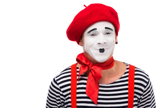 happy mime looking at camera isolated on white