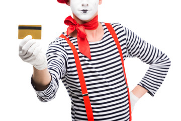 cropped image of mime showing credit card isolated on white