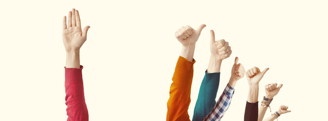 Fototapeta premium People showing thumbs raised up