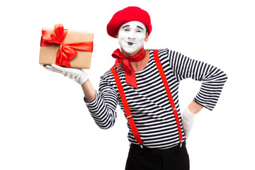 happy mime holding present box isolated on white