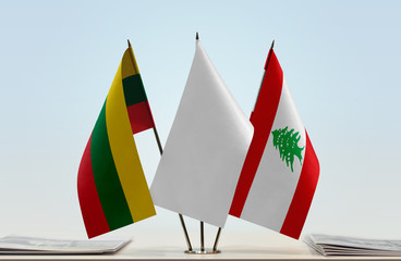 Flags of Lithuania and Lebanon with a white flag in the middle