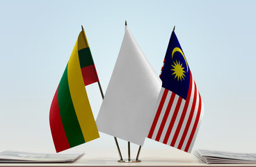 Flags of Lithuania and Malaysia with a white flag in the middle