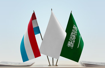 Flags of Netherlands and Saudi Arabia with a white flag in the middle