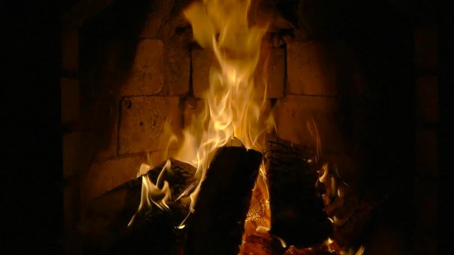 Fire in a fireplace. Slow motion