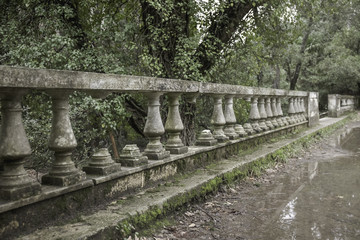 old abandoned park with ruined neoclassical constructions
