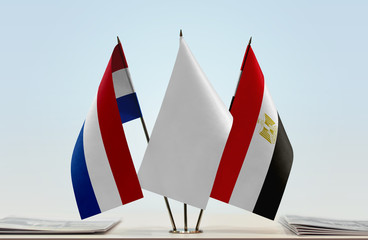 Flags of Netherlands and Egypt with a white flag in the middle