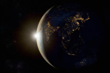 Fototapeta na wymiar 3D rendering of a sunrise on earth from space