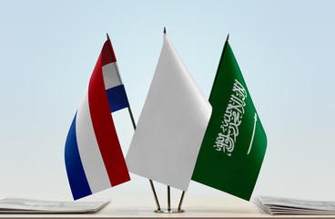 Flags of Netherlands and Saudi Arabia with a white flag in the middle