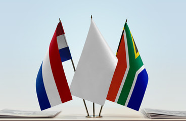 Flags of Netherlands and Republic of South Africa with a white flag in the middle