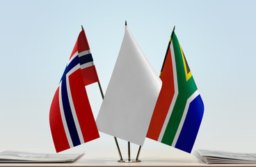 Flags of Norway and Republic of South Africa with a white flag in the middle