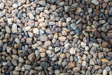 Stone pebbles texture background for interior exterior decoration and industrial construction concept design.