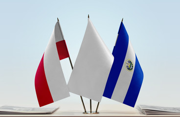 Flags of Poland and El Salvador with a white flag in the middle