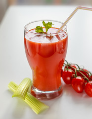 Tomato juice in a glass cup