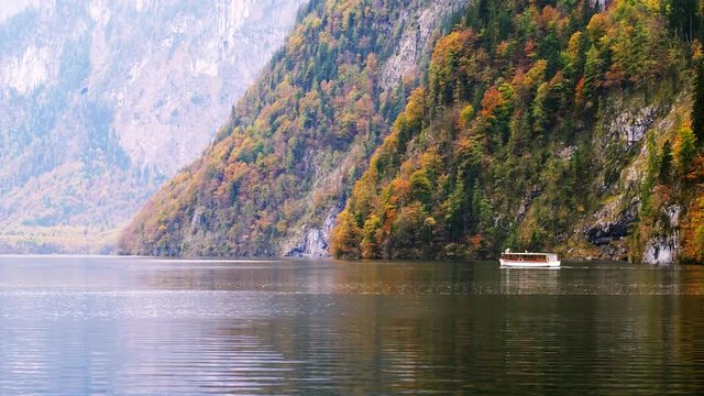 Konigssee lake with mountains and boat, Germany