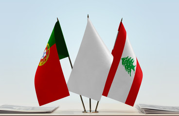 Flags of Portugal and Lebanon with a white flag in the middle