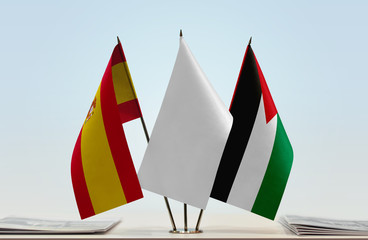 Flags of Spain and Palestine with a white flag in the middle