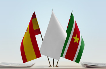 Flags of Spain and Suriname with a white flag in the middle