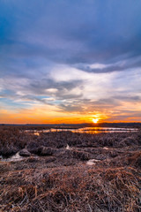 Sunset at Liberty Loop, part of the Wallkill River NWR, NJ, in late winter as the ice melts off the marshlands