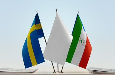 Flags of Sweden and Equatorial Guinea with a white flag in the middle