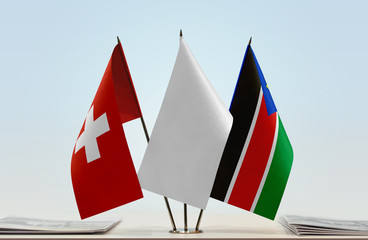 Flags of Switzerland and South Sudan with a white flag in the middle