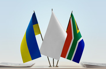 Flags of Ukraine and Republic of South Africa with a white flag in the middle