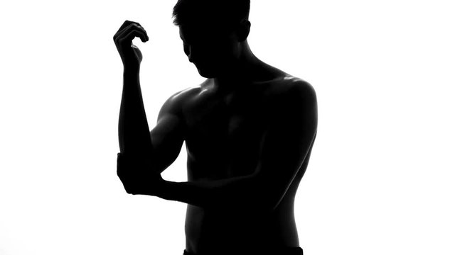 Bodybuilder suffering from elbow pain after sport accident, bones fracture