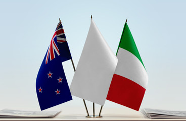 Flags of New Zealand and Italy with a white flag in the middle