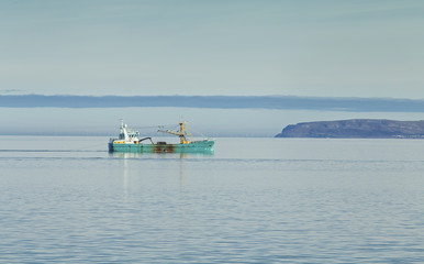 Fishing Boat on Calm Waters of Irish Sea