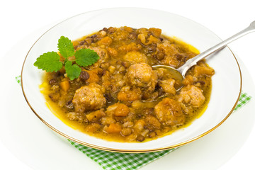 Fototapeta premium Vegetable lentil soup with meatballs