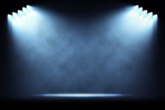 Rows of side spotlights illuminating empty stage