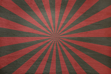 Red and grey slate background - with retro starburst in alternating stripes - abstract aged stone...
