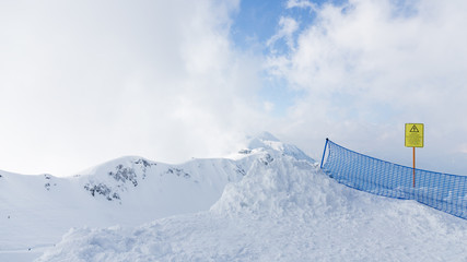 Fototapeta na wymiar High snowy mountains of Sochi
