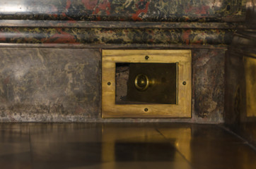 granite wall antique brass air duct door